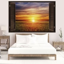 Vinyle fenêtres coucher de soleil dans le domaine 3D