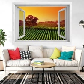Vinyle fen&ecirc;tre coucher de soleil dans le champ de fleurs 3d